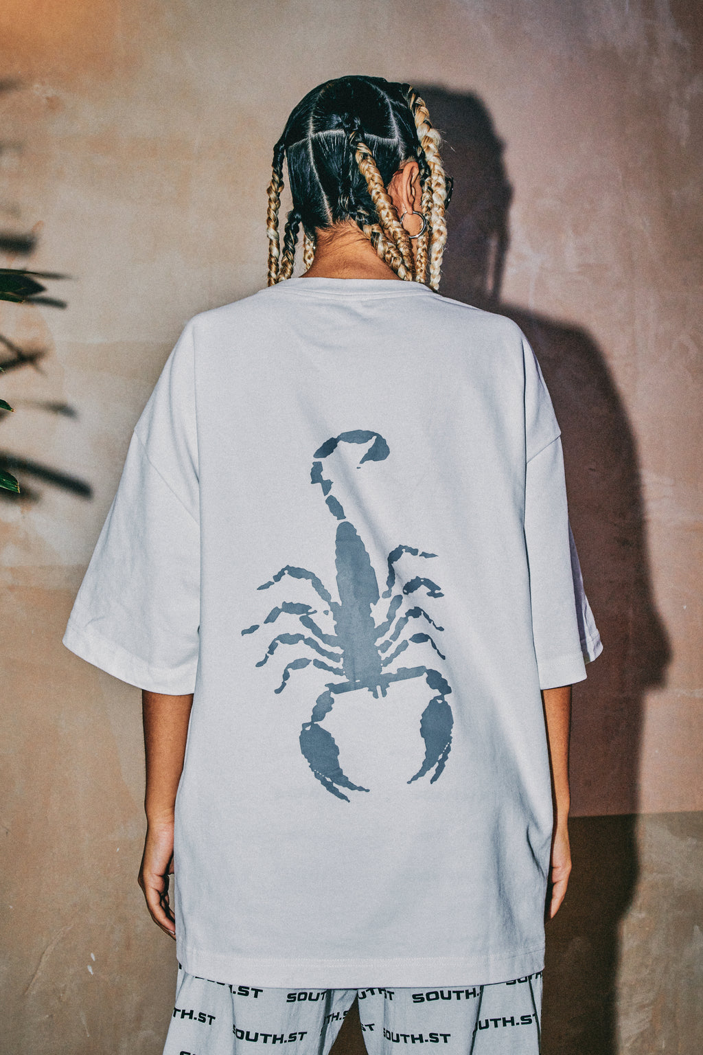 "STING" TEE
